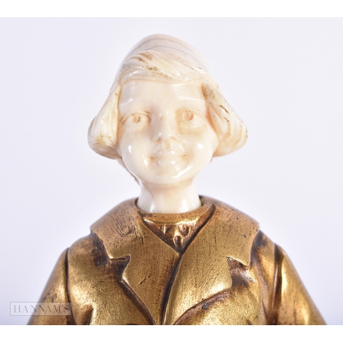 523 - AN ART DECO FRENCH GILT BRONZE FIGURE OF A YOUNG GIRL. 17 cm high.