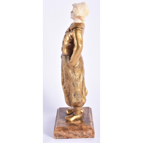 523 - AN ART DECO FRENCH GILT BRONZE FIGURE OF A YOUNG GIRL. 17 cm high.