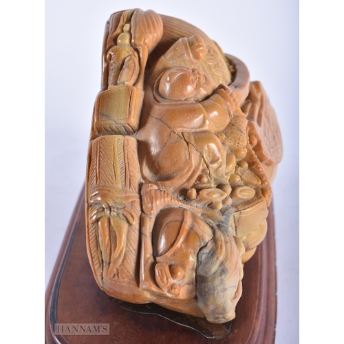 524 - AN EARLY 20TH CENTURY CHINESE CARVED SOAPSTONE BOULDER Late Qing/Republic. 20 cm x 14cm.