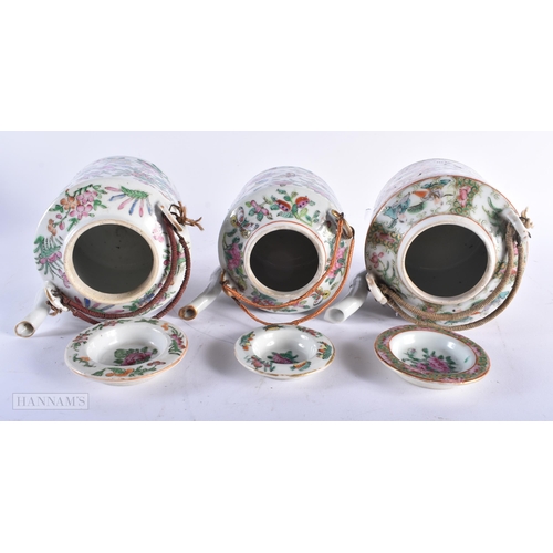 528 - THREE 19TH CENTURY CHINESE CANTON FAMILLE ROSE TEAPOTS AND COVERS together with a similar bowl. Larg... 