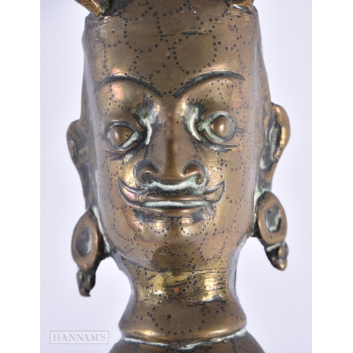 53 - A RARE LARGE 17TH/18TH CENTURY INDO TIBETAN BRONZE PHURBA formed with numerous buddhistic mask heads... 