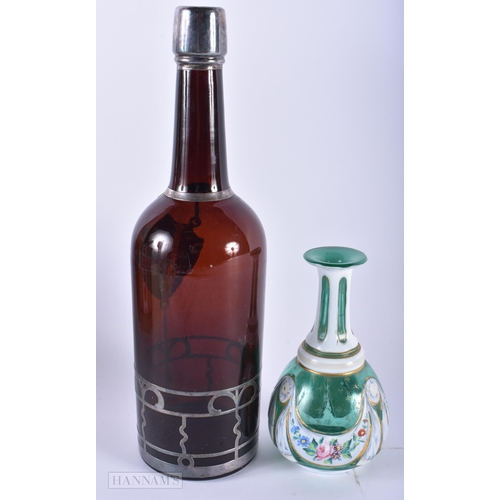 533 - A LATE 19TH CENTURY BOHEMIAN ENAMELLED GLASS SCENT BOTTLE together with a silver overlaid bottle. La... 