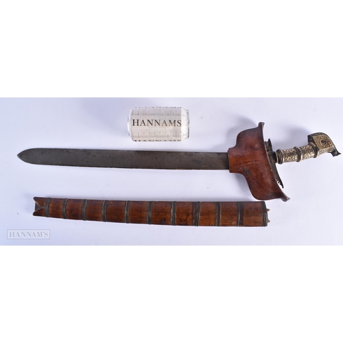 54 - A RARE LARGE 19TH CENTURY INDO PERSIAN REPOUSSE HANDLED KRISS KNIFE. 65 cm long. We do not offer in-... 