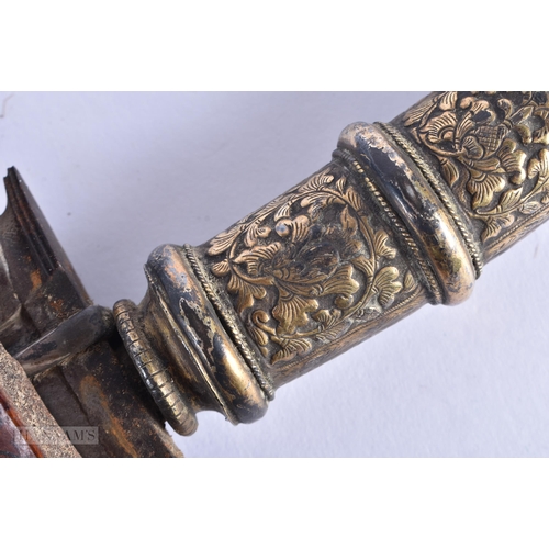 54 - A RARE LARGE 19TH CENTURY INDO PERSIAN REPOUSSE HANDLED KRISS KNIFE. 65 cm long. We do not offer in-... 