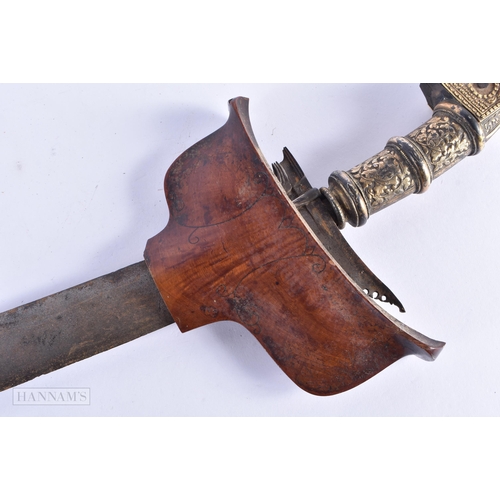 54 - A RARE LARGE 19TH CENTURY INDO PERSIAN REPOUSSE HANDLED KRISS KNIFE. 65 cm long. We do not offer in-... 