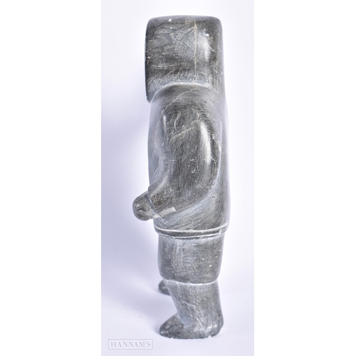 542 - AN ANTIQUE NORTH AMERICAN INUIT TRIBAL CARVED STONE FIGURE OF A HUNTER. 15cm x 9 cm.