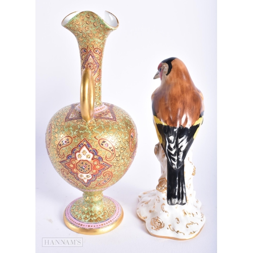 543 - A 19TH CENTURY ENGLISH ISLAMIC MARKET PORCELAIN JUG together with a Royal Worcester bird. Largest 20... 