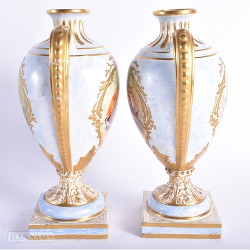 544 - A PAIR OF EARLY 19TH CENTURY ENGLISH TWIN HANDLED PORCELAIN VASES painted with shells and flowers. 2... 