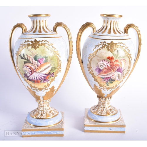 544 - A PAIR OF EARLY 19TH CENTURY ENGLISH TWIN HANDLED PORCELAIN VASES painted with shells and flowers. 2... 