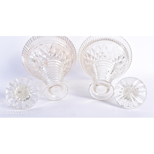 555 - A PAIR OF CUT GLASS SHIPS DECANTERS AND STOPPERS. 24 cm x 13 cm.