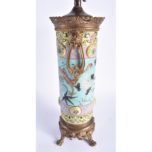 559 - A LARGE 19TH CENTURY CHINESE DAYA ZHAI PORCELAIN LAMP Qing, together with a famille noire figure. La... 