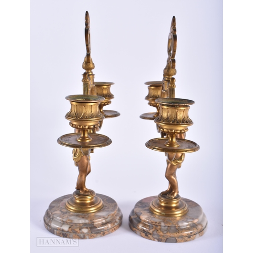 565 - A PAIR OF 19TH CENTURY FRENCH BRONZE AND MARBLE CANDLESTICKS. 24 cm x 15cm.