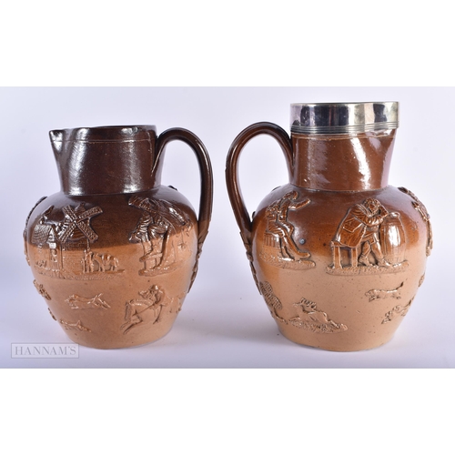 567 - TWO ANTIQUE ENGLISH STONEWARE JUGS. Largest 23 cm high. (2)