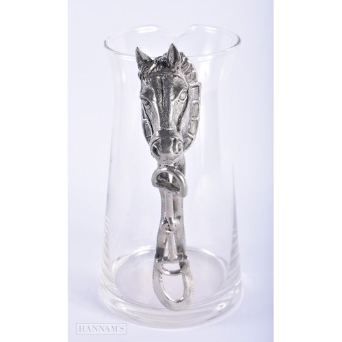 575 - A CONTINENTAL WHITE METAL HORSE HEAD GLASS PITCHER. 23 cm high.