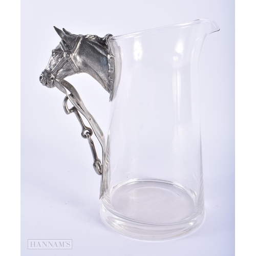 575 - A CONTINENTAL WHITE METAL HORSE HEAD GLASS PITCHER. 23 cm high.