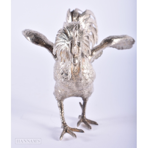 576 - AN ENGLISH SILVER MODEL OF A COCKERELL. 250 grams. 11cm x 10 cm.