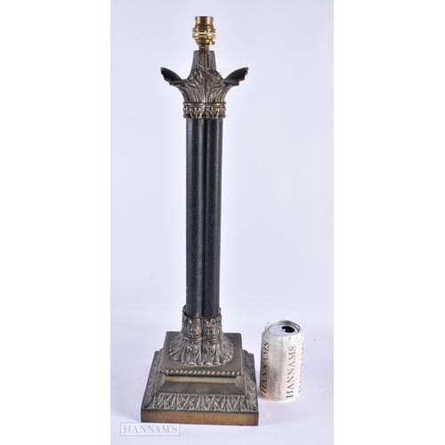 58 - AN ANTIQUE BRONZE FOUR PILLAR COUNTRY HOUSE LAMP. 55 cm high.