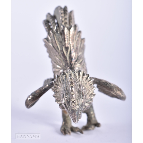 580 - A 19TH CENTURY INDIAN MIDDLE EASTERN WHITE METAL FIGURE OF A BIRD. 223 grams. 8 cm wide.