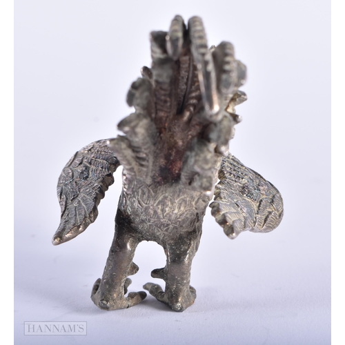 580 - A 19TH CENTURY INDIAN MIDDLE EASTERN WHITE METAL FIGURE OF A BIRD. 223 grams. 8 cm wide.