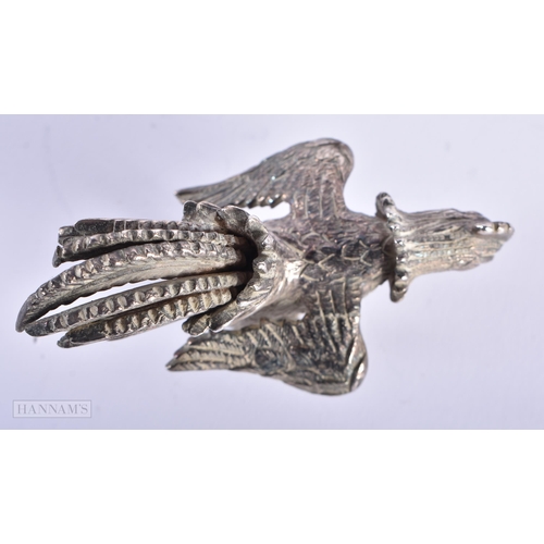 580 - A 19TH CENTURY INDIAN MIDDLE EASTERN WHITE METAL FIGURE OF A BIRD. 223 grams. 8 cm wide.