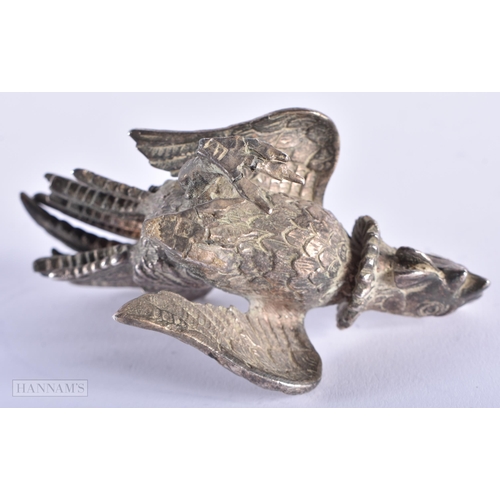 580 - A 19TH CENTURY INDIAN MIDDLE EASTERN WHITE METAL FIGURE OF A BIRD. 223 grams. 8 cm wide.