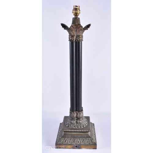 58 - AN ANTIQUE BRONZE FOUR PILLAR COUNTRY HOUSE LAMP. 55 cm high.