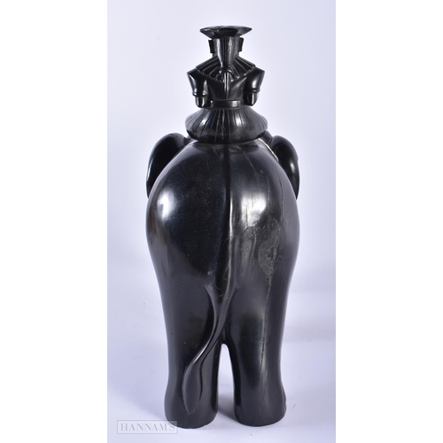 584 - A LARGE ANTIQUE INDIAN EBONY FIGURE OF AN ELEPHANT together with a Victorian burr walnut decanter bo... 