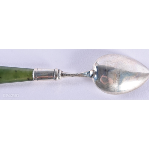 587 - A CONTINENTAL SILVER AND JADE SPOON. 9 grams. 10 cm long.