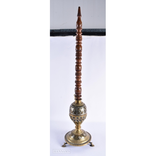 59 - A LARGE EARLY 20TH CENTURY MIDDLE EASTERN ISLAMIC SILVER OVERLAID HOOKAH PIPE. 80 cm high.