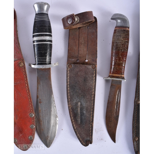 591 - FIVE VINTAGE KNIVES including ones with horn handles. Largest 22cm wide. (5)