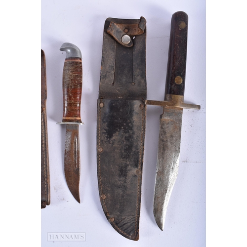 591 - FIVE VINTAGE KNIVES including ones with horn handles. Largest 22cm wide. (5)