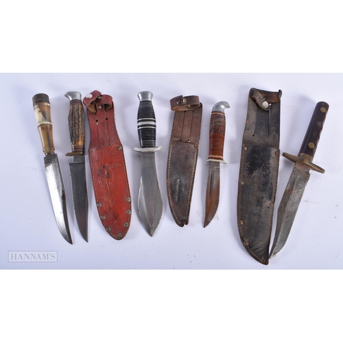 591 - FIVE VINTAGE KNIVES including ones with horn handles. Largest 22cm wide. (5)