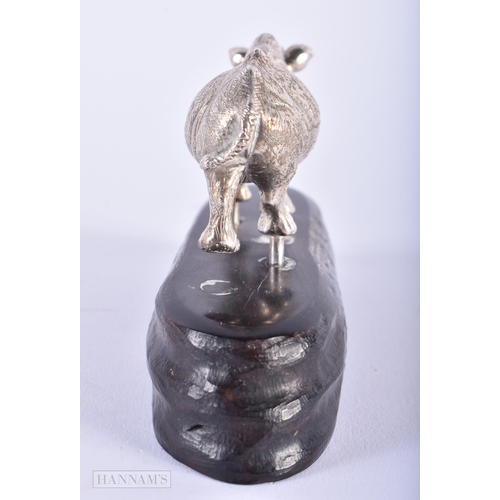 595 - AN ENGLISH SILVER MODEL OF A RHINO by Patrick Mavros. Rhino not inc stand 193 grams. 10 cm x 7 cm.