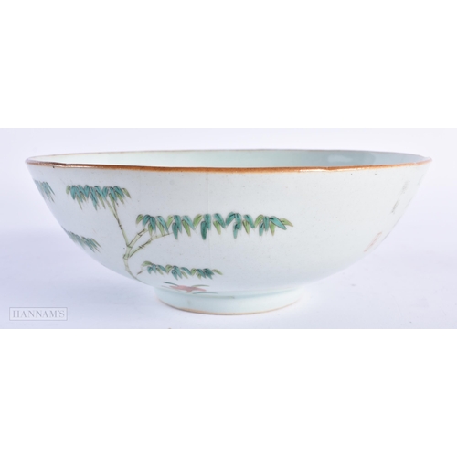 607 - A 19TH CENTURY CHINESE PORCELAIN FAMILLE ROSE BOWL Qing, painted with calligraphy and bamboo. 20 cm ... 