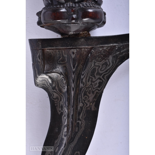 624 - AN ANTIQUE BURMESE ASIAN CARVED WOOD CASED KRIS DAGGER. 60cm long.  We do not offer in-house shippin... 