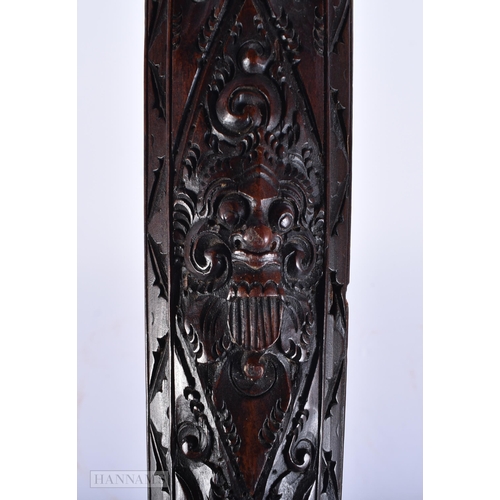 624 - AN ANTIQUE BURMESE ASIAN CARVED WOOD CASED KRIS DAGGER. 60cm long.  We do not offer in-house shippin... 