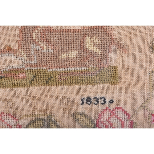 635 - A 19TH CENTURY ENGLISH FRAMED AND EMBROIDERED SAMPLER. 62 cm x 58 cm.