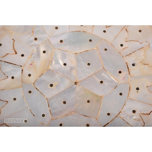 644 - AN INDIAN GOA MOTHER OF PEARL DISH. 18cm wide.