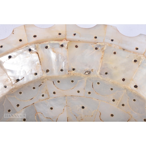 644 - AN INDIAN GOA MOTHER OF PEARL DISH. 18cm wide.