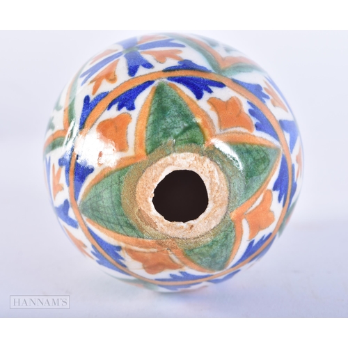 645 - AN ARMENIAN CERAMIC KUTAHYA EGG. 11cm x 7 cm.