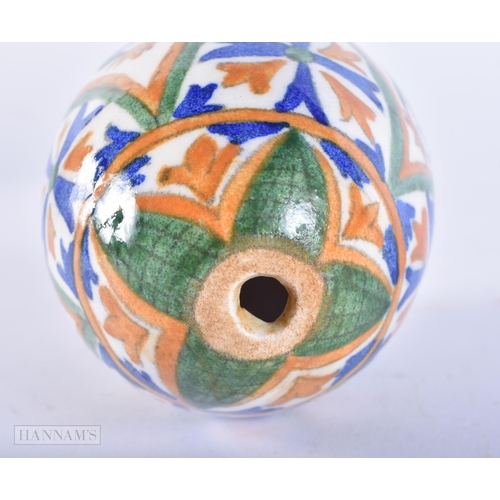 645 - AN ARMENIAN CERAMIC KUTAHYA EGG. 11cm x 7 cm.