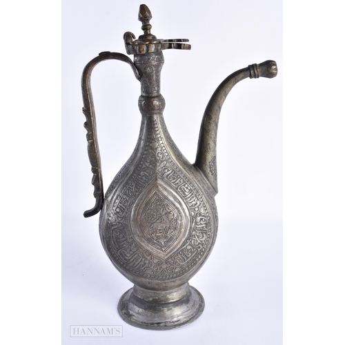 67 - A LARGE 17TH/18TH CENTURY MIDDLE EASTERN ISLAMIC EWER decorated with birds and scripture. 38cm x 22c... 