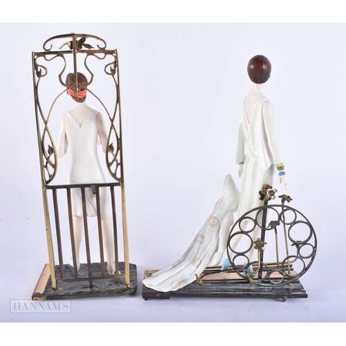 672 - A PAIR OF ALBANY BRONZE AND PORCELAIN FIGURES Wimbledon & Ritz. 24 cm high.