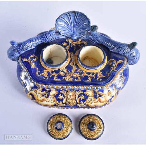 70 - A 19TH CENTURY ITALIAN MAJOLICA COUNTRY HOUSE INKWELL AND COVER painted with figures riding mythical... 