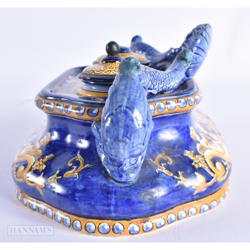 70 - A 19TH CENTURY ITALIAN MAJOLICA COUNTRY HOUSE INKWELL AND COVER painted with figures riding mythical... 