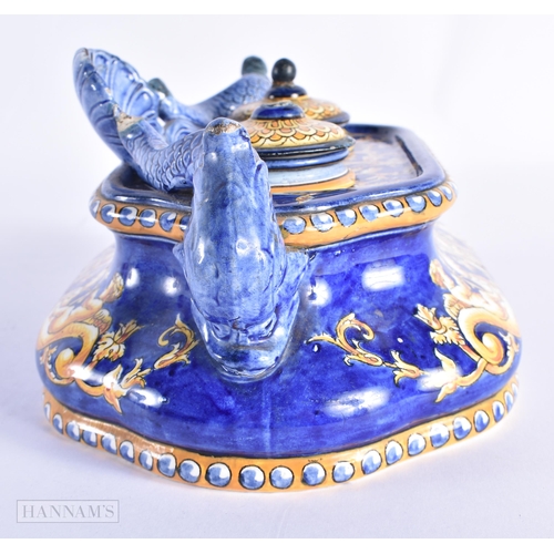 70 - A 19TH CENTURY ITALIAN MAJOLICA COUNTRY HOUSE INKWELL AND COVER painted with figures riding mythical... 