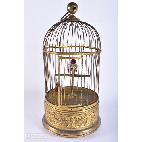 705 - A LARGE 19TH CENTURY EUROPEAN GILT METAL CASED AUTOMATON SINGING BIRD CAGE. 52 cm x 20 cm.