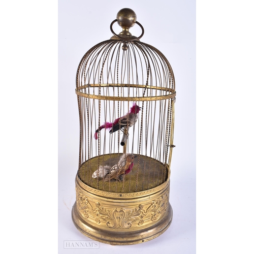 705 - A LARGE 19TH CENTURY EUROPEAN GILT METAL CASED AUTOMATON SINGING BIRD CAGE. 52 cm x 20 cm.