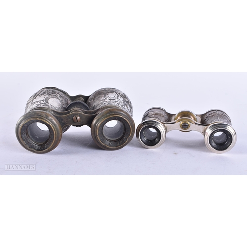 707 - A SILVER RHINOCEROS HEAD BOTTLE STOPPER together with two pairs of opera glasses. (3)