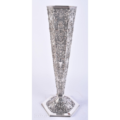 717 - A VERY LARGE ANTIQUE DUTCH SILVER PLATED REPOUSSE VASE. 40 cm high.